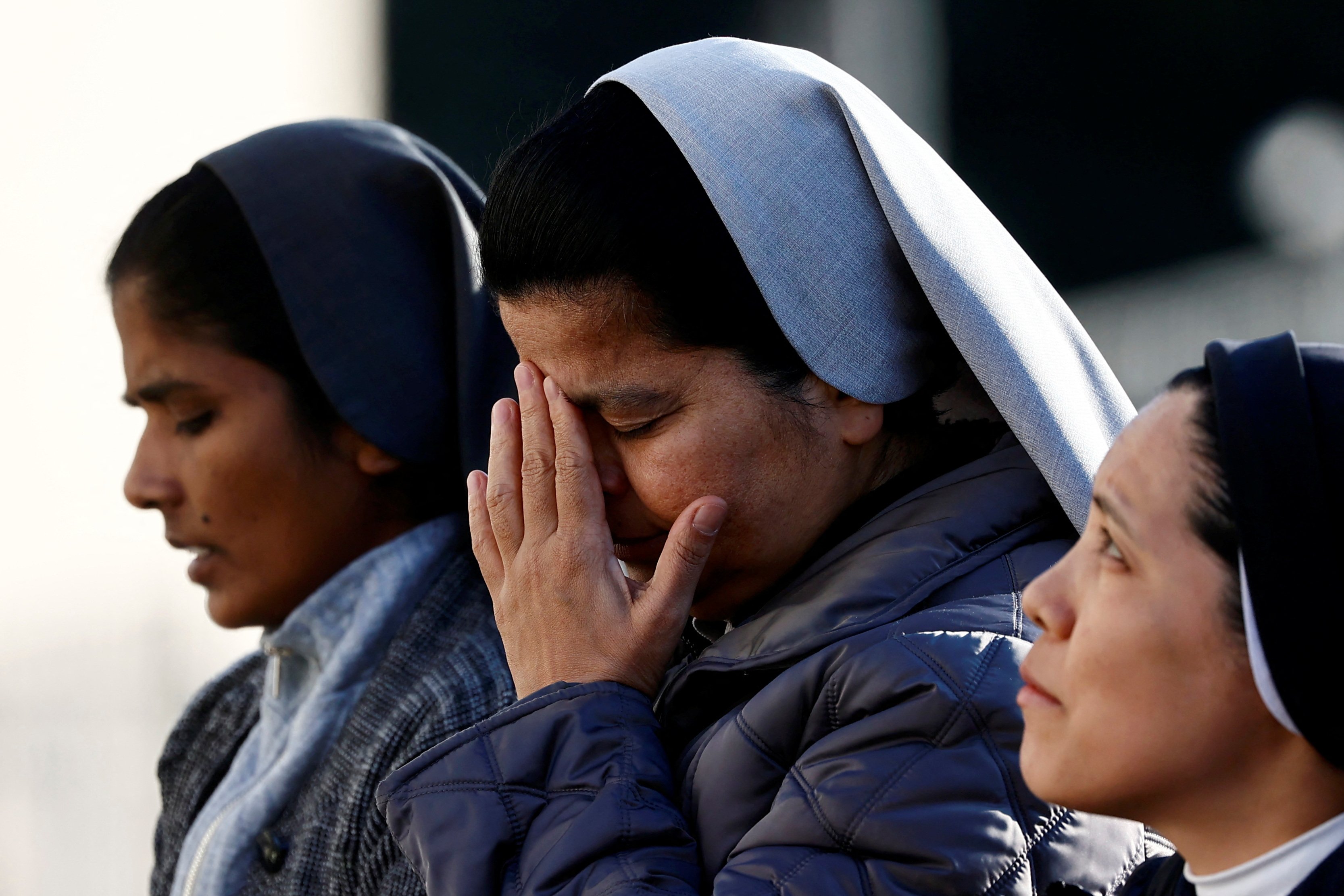 Nuns pray in front of Rome’s Gemelli Hospital Feb. 22, 2025, where Pope Francis is admitted for treatment. The 88-year-old pontiff was in critical condition Feb. 22 after he suffered a prolonged asthmatic respiratory crisis while being treated for pneumonia and a complex lung infection, the Vatican said. 