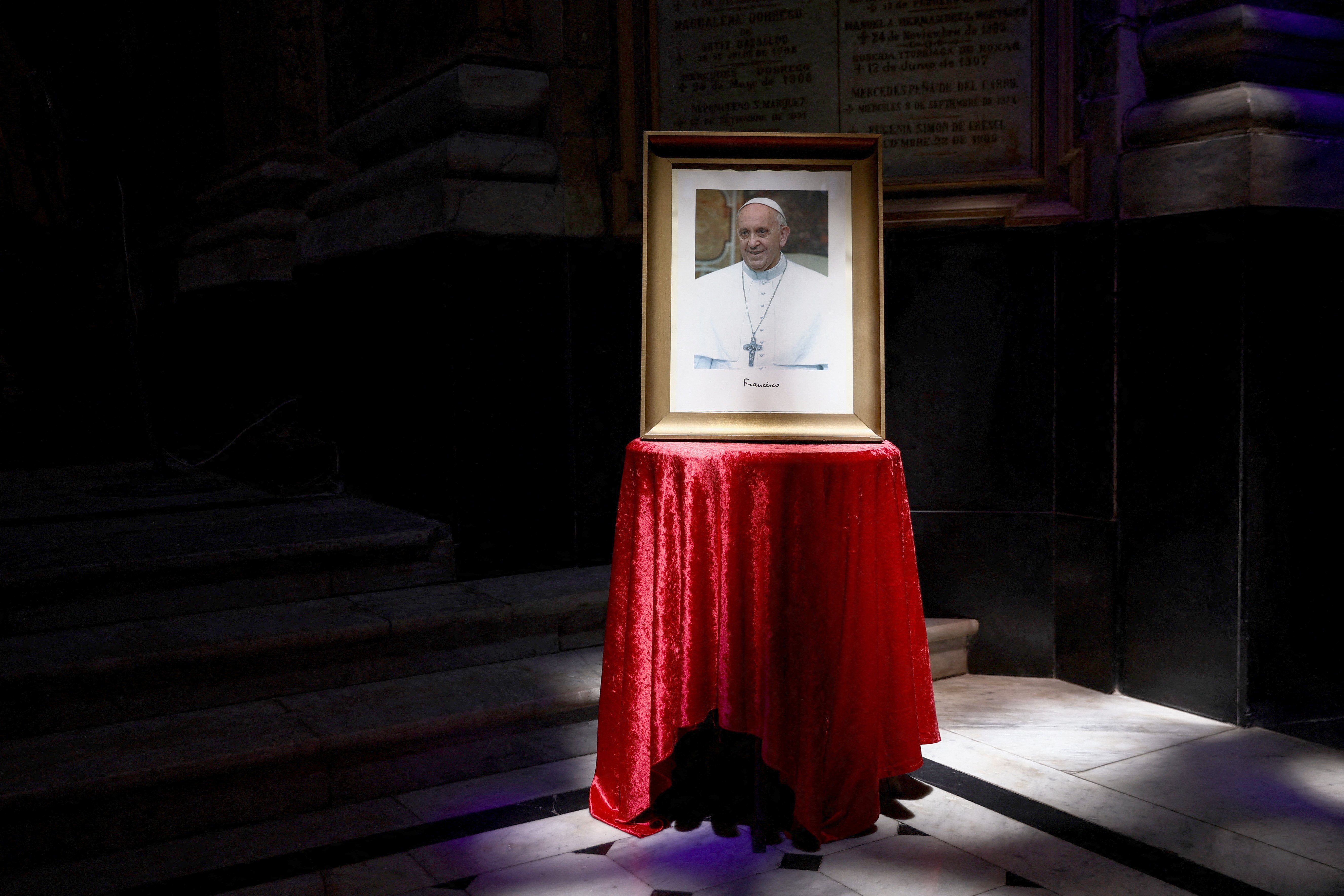 A portrait of Pope Francis is displayed at the Basilica San Jose de Flores in Buenos Aires, Argentina, Feb. 21, 2025, where Pope Francis, then Cardinal Jorge Bergoglio, once served. The 88-year-old pontiff was in critical condition Feb. 22 after he suffered a prolonged asthmatic respiratory crisis while being treated for pneumonia and a complex lung infection, the Vatican said. (OSV News photo/Tomas Cuesta, Reuters)