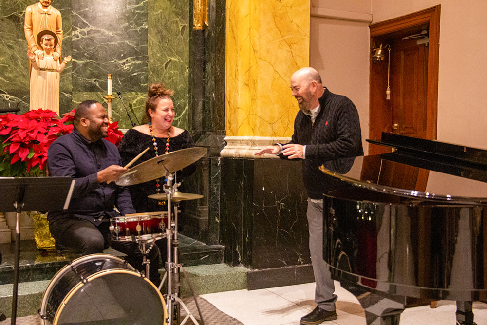 Meredith Augustin rehearses with Manny Laine and William Mulligan at St. Francis of Assisi in Manhattan, N.Y. (Karen Lindell)