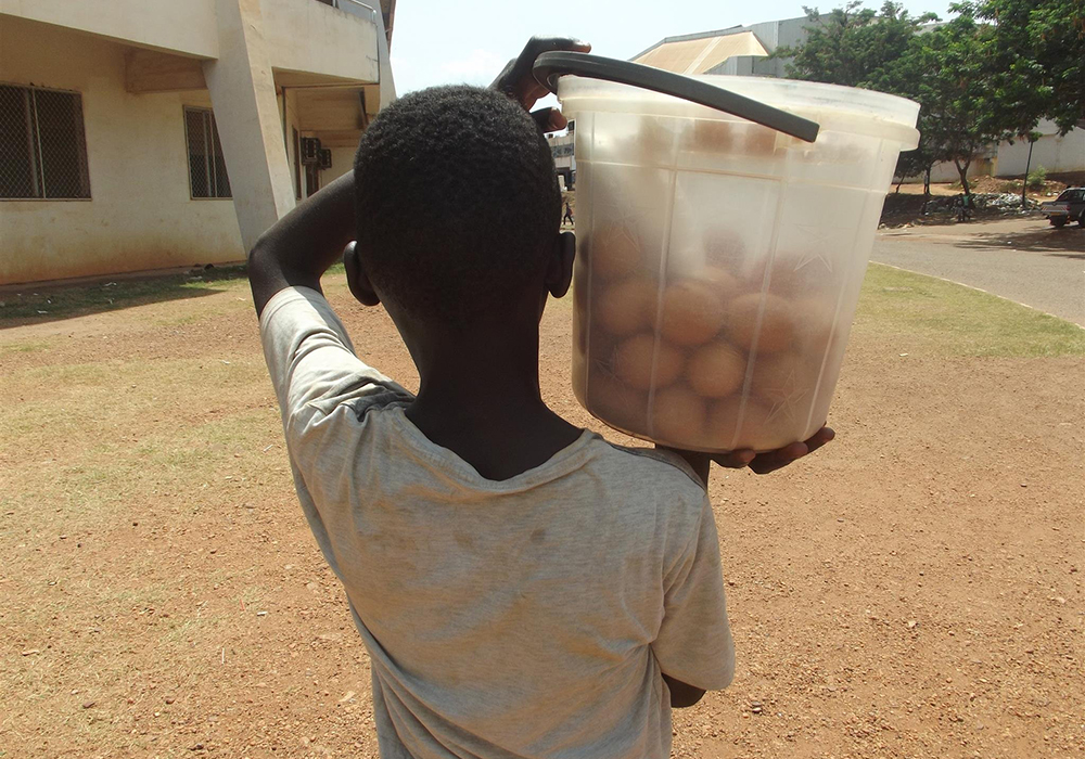 A boy sells eggs on the streets of Bangui, Central African Republic, in April 2021. (CNS/Reuters/Ines Kpakole)