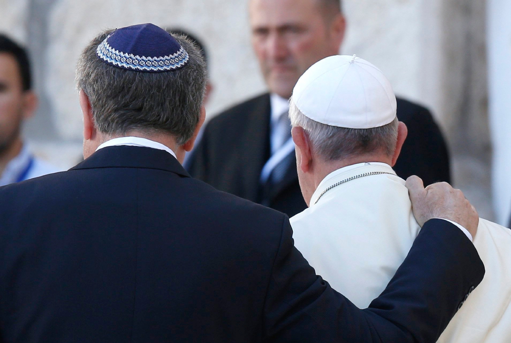 Rabbi Abraham Skorka of Buenos Aires, Argentina, and Pope Francis embrace after visiting the Western Wall in Jerusalem May 26, 2014. (CNS/Paul Haring)