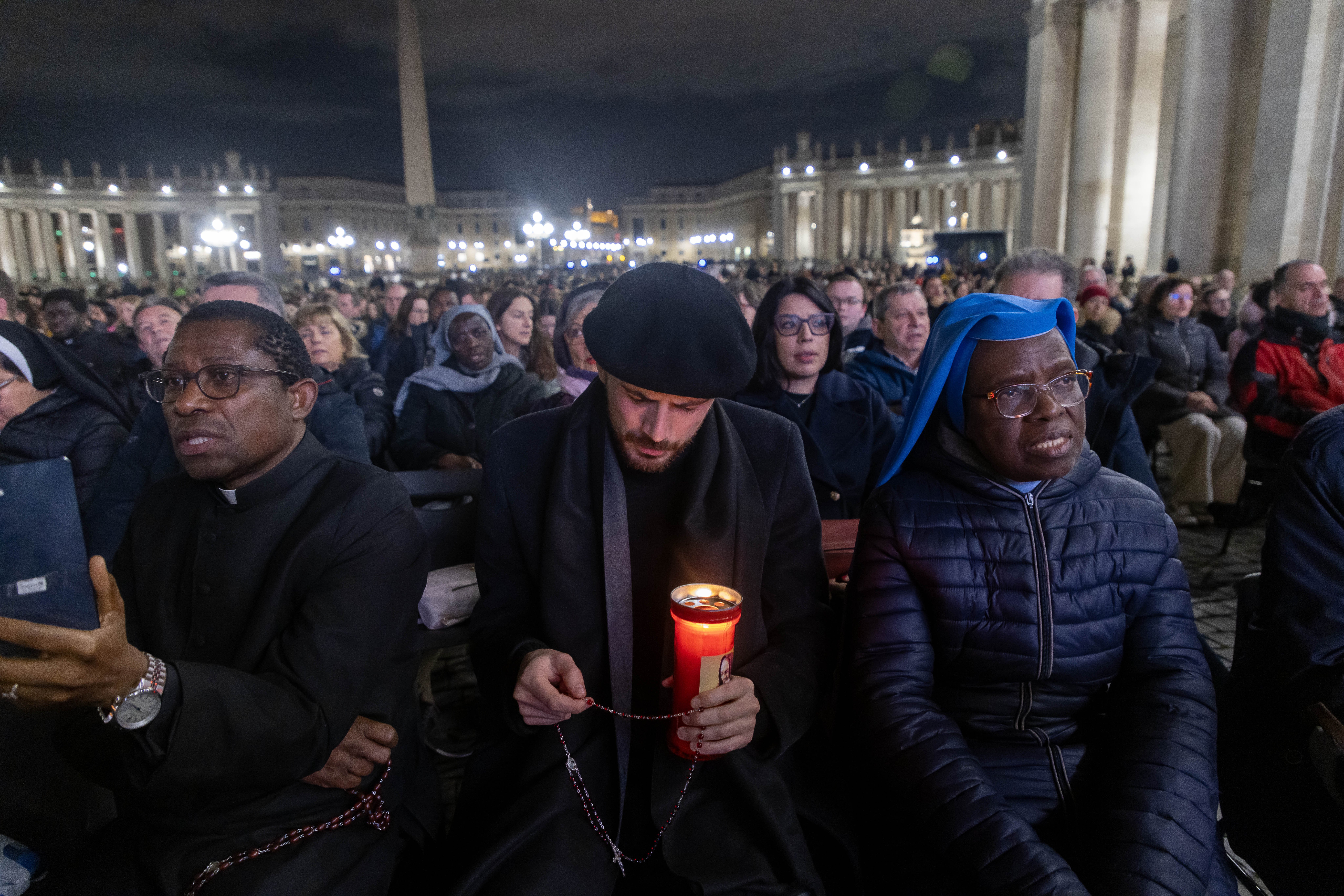  People join Cardinal Víctor Manuel Fernández, prefect of the Dicastery for the Doctrine of the Faith, for the recitation of the rosary for Pope Francis in St. Peter’s Square at the Vatican Feb. 28, 2025. Pope Francis has been hospitalized since Feb. 14 with double pneumonia. (CNS photo/Pablo Esparza)