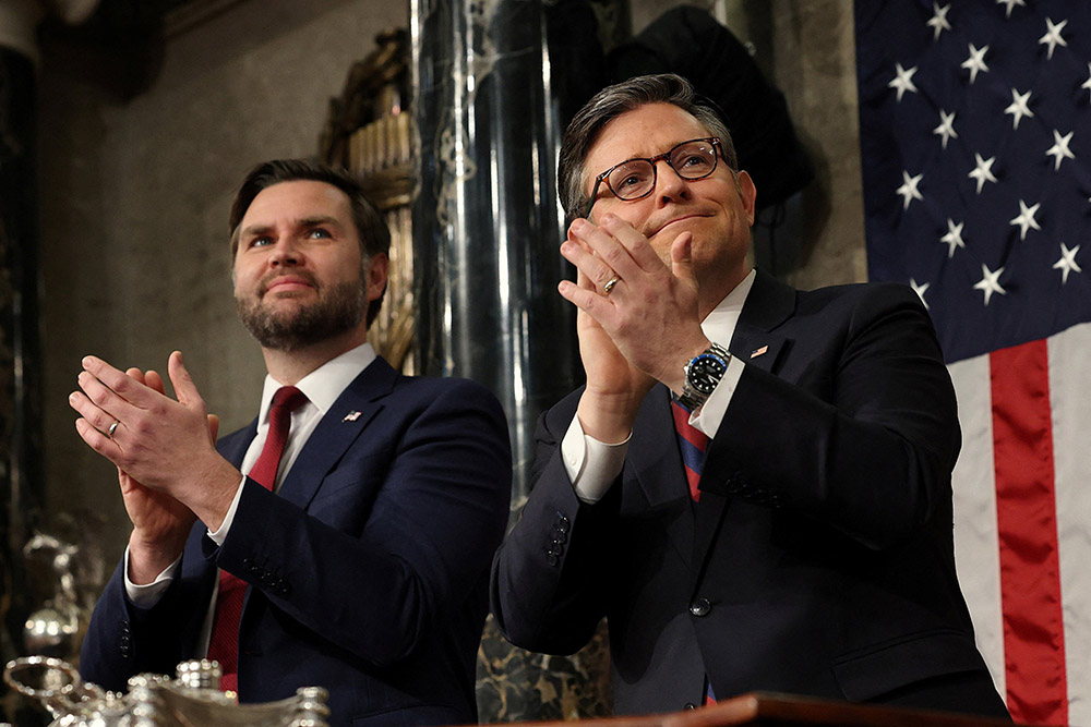 U.S. Vice President JD Vance and House Speaker Mike Johnson, R-La., applaud as President Donald Trump addresses a joint session of Congress at the U.S. Capitol in Washington March 4, 2025. (OSV News/Reuters/Win McNamee)