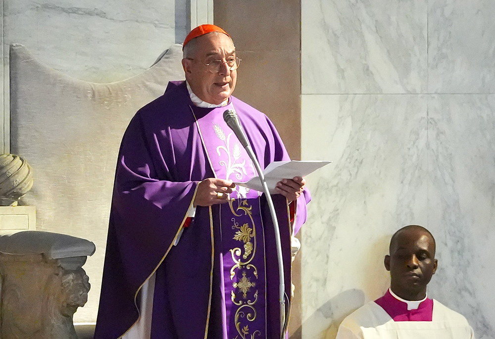 Cardinal Angelo De Donatis, head of the Apostolic Penitentiary, reads the homily Pope Francis prepared for the celebration of Ash Wednesday Mass at the Basilica of Santa Sabina, March 5 in Rome. The pope, who is hospitalized, delegated the cardinal to preside at the liturgy. (CNS/Lola Gomez)