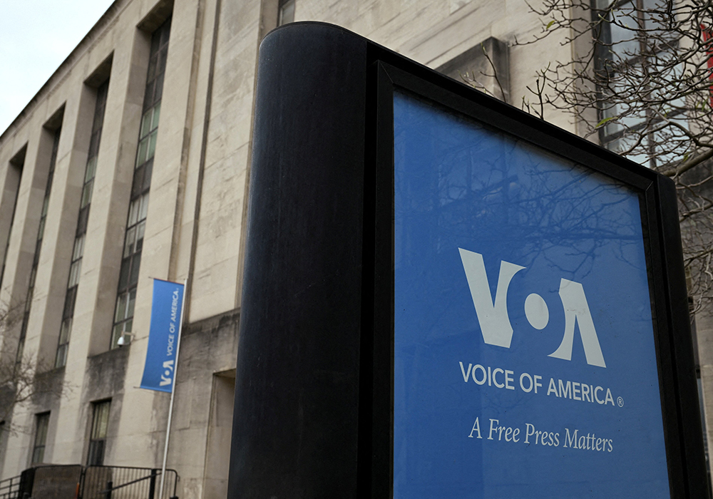 Signage is seen outside the Voice of America building March 16 in Washington, a day after more than 1,300 employees of the media broadcaster, which operates in almost 50 languages, were placed on leave. Metropolitan Archbishop Borys Gudziak spoke out that day about the Trump administration's shutdown of VOA, which will have an impact on graduates of Ukrainian Catholic University's journalism school. (OSV News/Reuters/Annabelle Gordon)