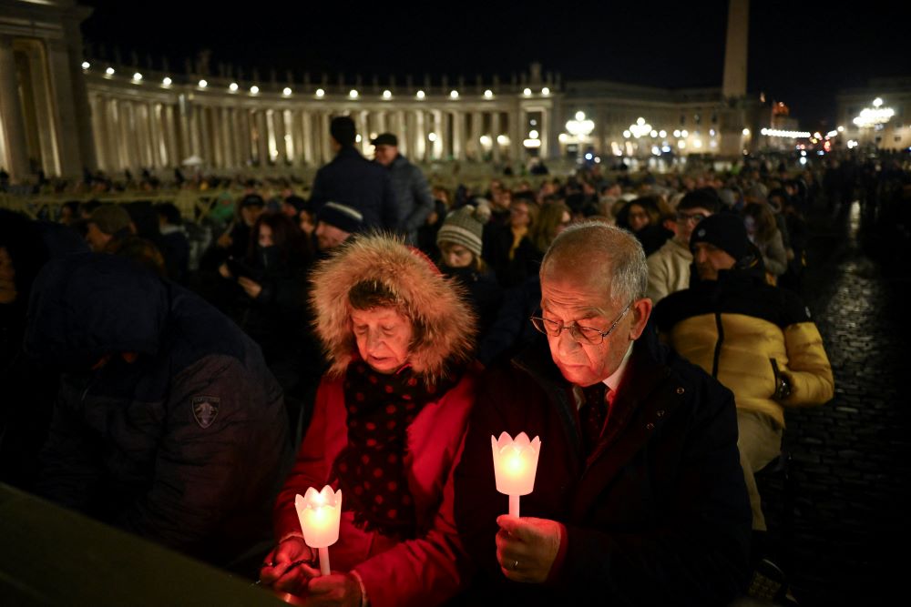 Worshippers attend a prayer service in St. Peter's Square March 2, while Pope Francis continues receiving treatment for double pneumonia after being admitted to Rome's Gemelli Hospital Feb. 14. (OSV News/Reuters/Dylan Martinez)