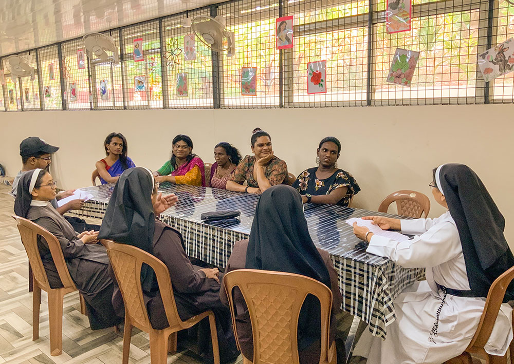 Sisters and residents discuss plans for a musical at Jyothis Bhavan, a short-stay home in Kochi, southern Kerala, India, for young transgender people hoping to integrate into the social mainstream. (Binu Alex)