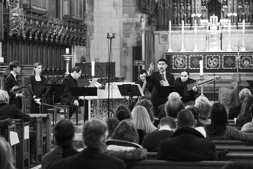 Andrew Padgett as Demonio (bass baritone) with Academy of Sacred Drama instrumentalists in the background perform "The Man at the Crossroads" on Nov. 24, 2019, at St. Vincent Ferrer Church in New York City. (Courtesy of David Thompson Fairchild)