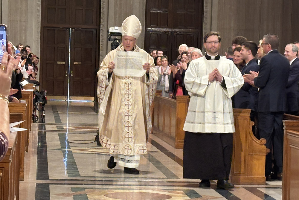 Washington Cardinal Robert McElroy in the opening procession of his installation Mass March 11 at the Basilica of the Shrine of the Immaculate Conception. (NCR photo/James V. Grimaldi)