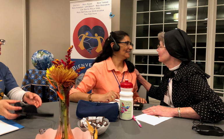 Following a presentation during the Oct. 24-27 conference in Cleveland on anti-trafficking ministries, sisters reflect on standout details and similarities or differences between their experiences back home and those shared. (GSR photo / Soli Salgado)