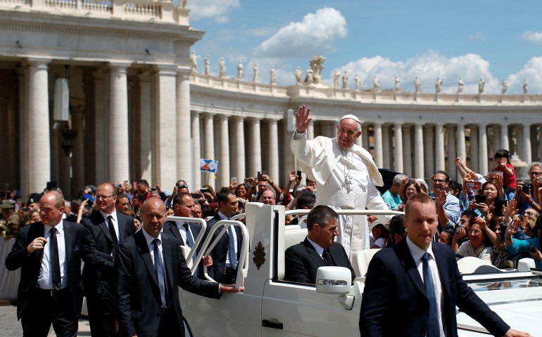 Pope Francis waves as he arrives to lead his general audience in St. Peter's Square May 10 at the Vatican. (CNS photo/Tony Gentile, Reuters)