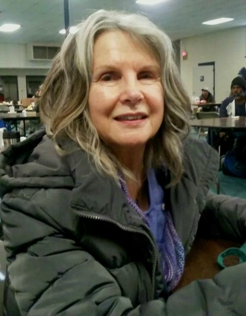 Parishioner Jan Rose sits in St. Francis Kitchen, St. Francis of Assisi Church's outreach to the homeless. (Peter Feuerherd)