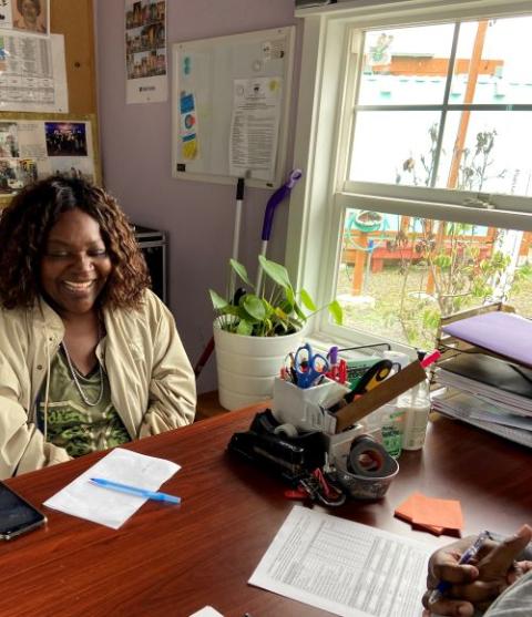 Chiquita Pulliam at a desk