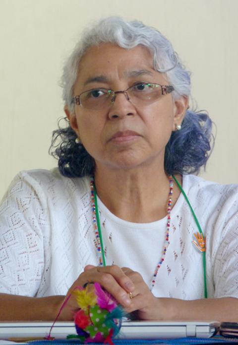 Sr. Carmen Ugarte, a member of the Oblate Sisters of the Holy Redeemer, listens to a survivor of human trafficking during a seminar on the topic Aug. 18 in Guatemala City. (GSR photo/Rhina Guidos)