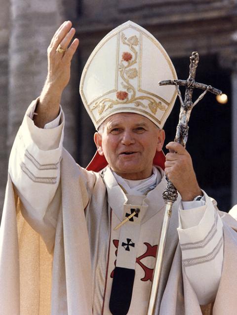 St. John Paul II waves to well-wishers in St. Peter's Square at the Vatican in 1978. (CNS/L'Osservatore Romano/Arturo Mari)