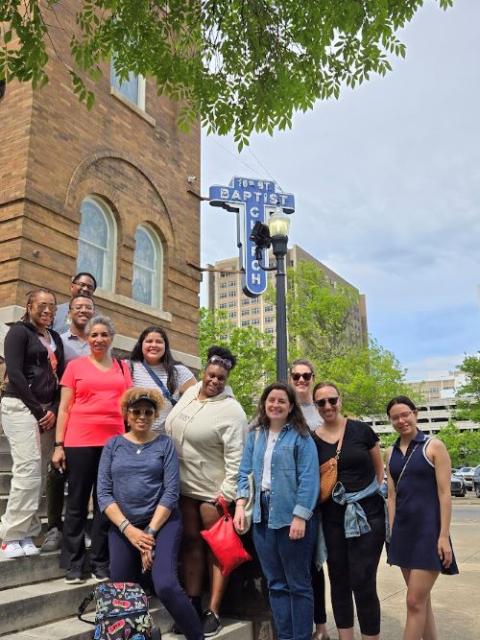 Graduate students in theology and ministry at Catholic Theological Union walk pose at Dexter Avenue Baptist Church, where Martin Luther King Jr. served as pastor. 