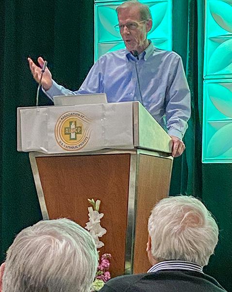 Archbishop John Wester accepts the St. John XXIII Award from the Association of U.S. Catholic Priests on June 26. (Michael Centore)