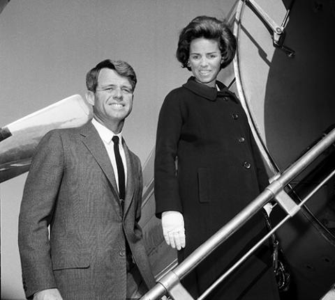 U.S. Senator-elect Robert F. Kennedy is shown with his wife Ethel boarding plane, Nov. 4, 1964, in New York City at LaGuardia Airport for flight to Glens Falls, N.Y. (AP/File)