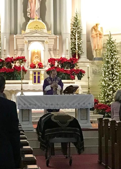 Fr. Richard Bona presided at the funeral Mass for longtime St. Elizabeth of Hungary parishioner Margaret German on Jan. 3. The altar was restored in November. (Courtesy of Mark Yonke)