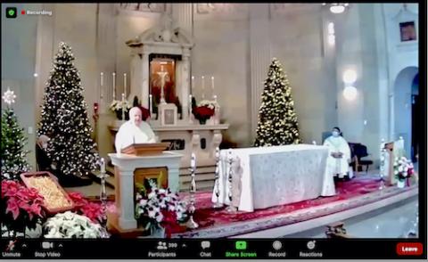 Jesuit Fr. Bill Russell preaches at the funeral for Jesuit Fr. Bill Barry at Campion Center in Weston, Massachusetts, Dec. 22. (NCR screenshot)