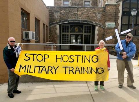 A Stations of the Cross on Marquette University's campus protests its ROTC program March 28. (Bob Graf)