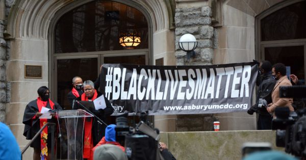 A church installs a Black Lives Matter banner ahead of pro-Trump protests  in Washington, DC