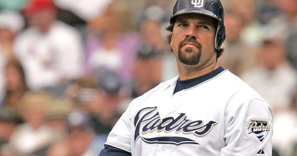 Mike Piazza of the San Diego Padres acknowledges the fans on his