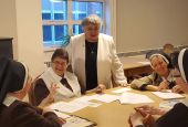 Dominican Sr. Patricia Wormann (in white jacket), delegate for religious for the Archdiocese of Newark, New Jersey facilitates a synod listening session with the Felician Sisters of Lodi, New Jersey. (Courtesy of Donna Ciangio)