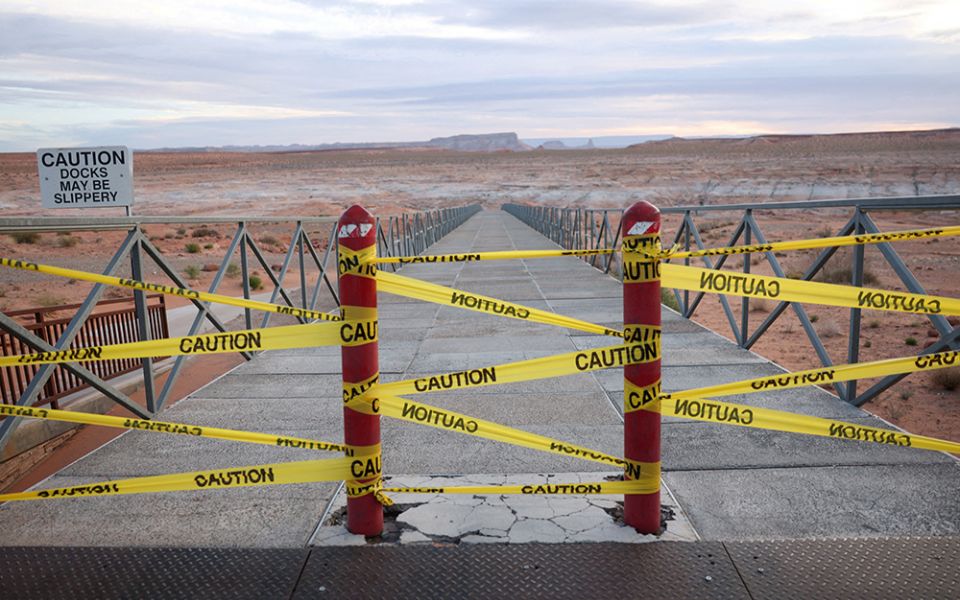 A closed boat ramp at Lake Powell in Page, Arizona, extends into desert sand April 19. (CNS/Reuters/Caitlin Ochs)