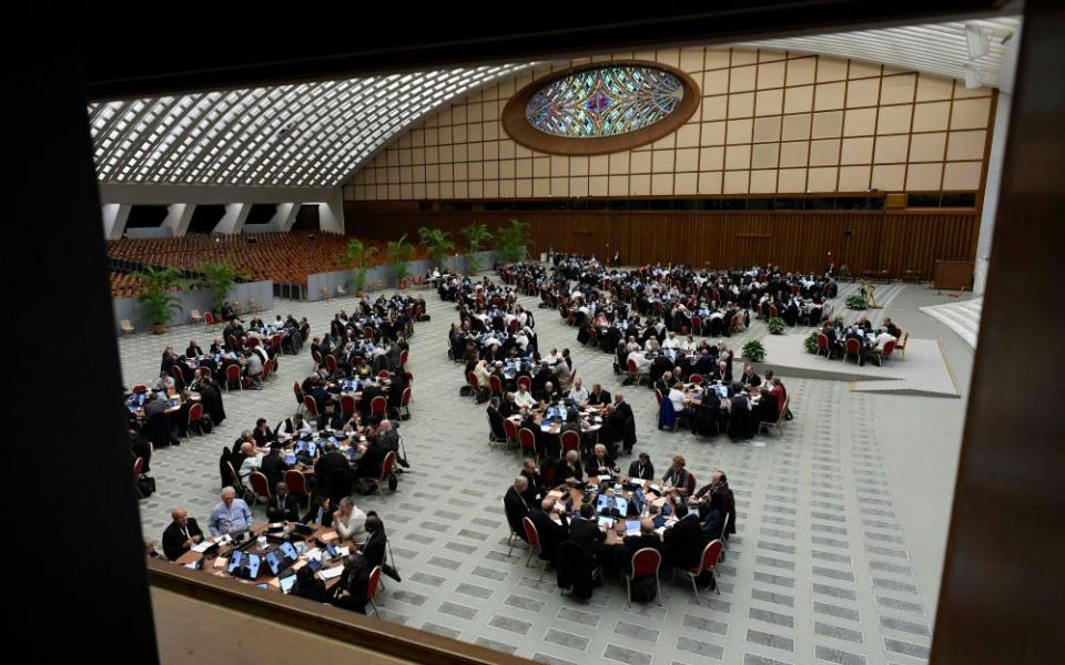 An overview of room with round tables