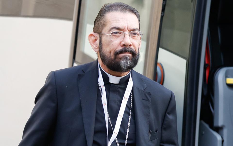 U.S. Bishop Daniel Flores of Brownsville, Texas, arrives for a working session of the assembly of the Synod of Bishops at the Vatican Oct. 16. (CNS/Lola Gomez)