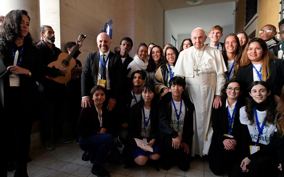 Pope Francis poses after he inaugurated the new headquarters of Scholas Occurrentes, the Vatican's foundation that works to link technology and the arts for social integration and world peace, in Rome Dec. 13, 2019. (CNS/Vatican Media)