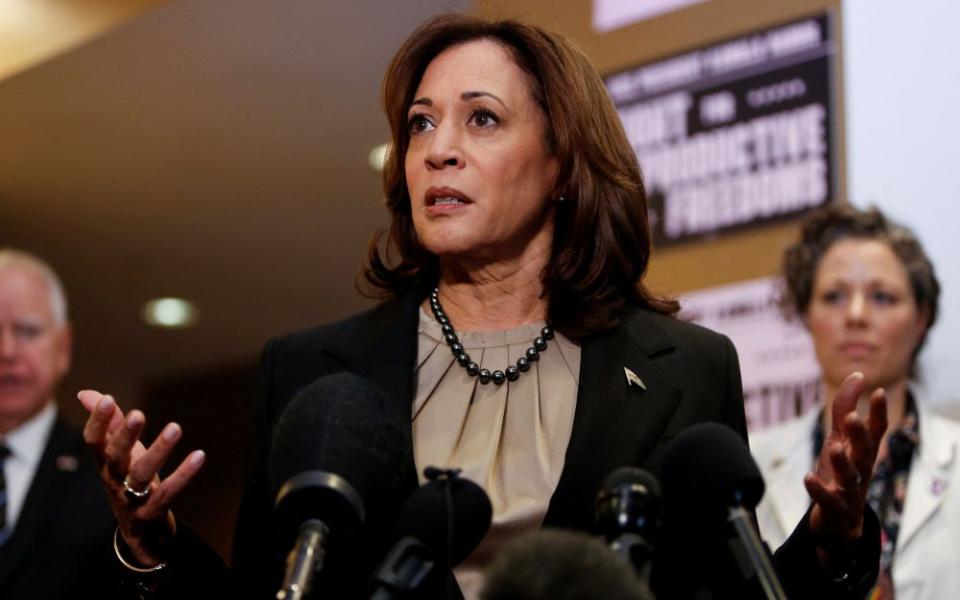 Minnesota Gov. Tim Walz and Dr. Sarah Traxler look on as U.S. Vice President Kamala Harris speaks as she visits an abortion clinic in Minneapolis March 14. It was the first time a president or vice president visited an abortion clinic. (OSV News/Reuters/Nicole Neri)