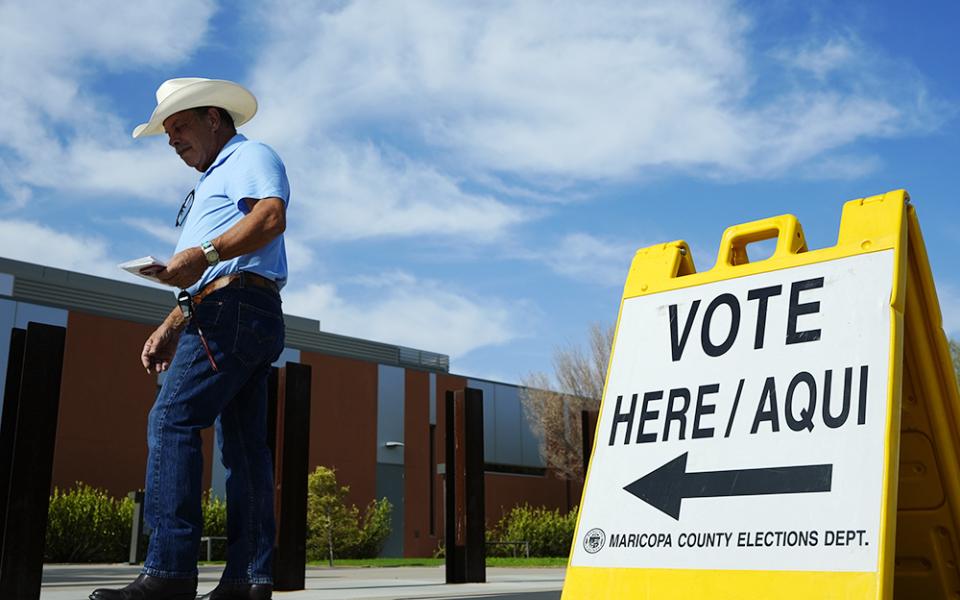 A voter walks to a voting precinct prior to casting his ballot in the state's primary election July 30, 2024, in El Mirage, Arizona. (AP file/Ross D. Franklin)