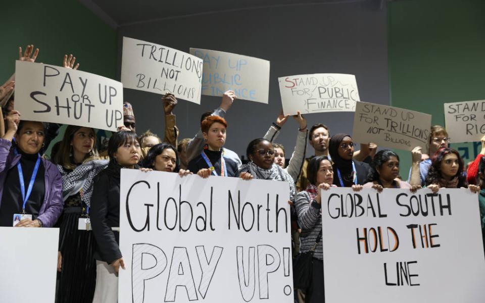 Climate activists hold a demonstration in response to a target for financing climate change responses under negotiation at the United Nations climate change conference, in Baku, Azerbaijan. The summit, called COP29, ultimately struck a deal for $300 billion by 2035 for developing countries. (UN Climate Change/Kiara Worth)