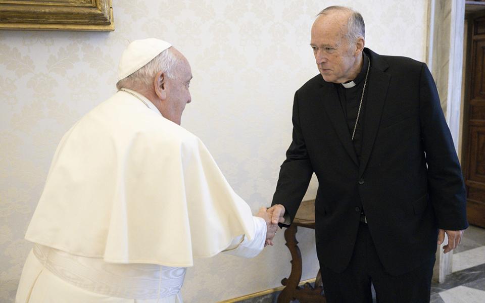 Pope Francis greets Cardinal Robert McElroy of San Diego in the library of the Apostolic Palace at the Vatican on Oct. 10, 2024. (CNS/Vatican Media)