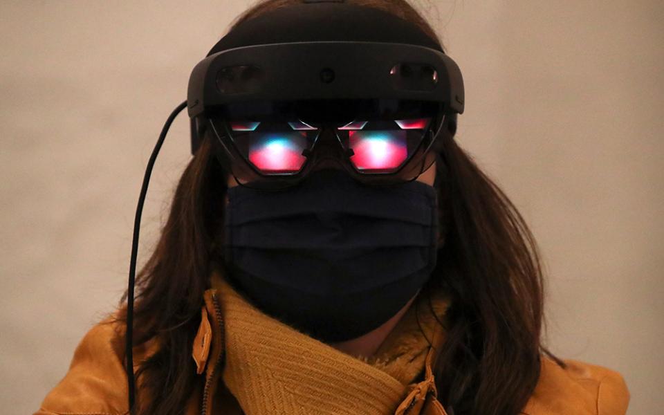 Virtual glasses using artificial intelligence are seen in this photo. (CNS/Reuters/Yves Herman)