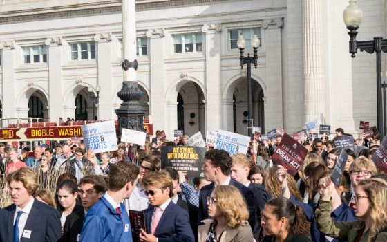 More than 1,400 young people attending the Ignatian Family Teach-In for Justice fill Columbus Circle in Washington to listen to speakers before moving on to Capitol Hill to advocate for justice Nov. 6. (CNS/Elizabeth A. Elliott, Arlington Catholic Herald)