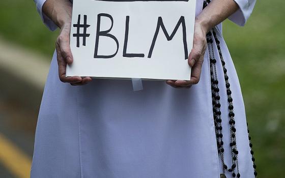 A Dominican sister protests racial injustice June 2 in Washington, D.C. (CNS/Tyler Orsburn)