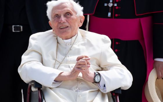 Retired Pope Benedict XVI smiles at Germany's Munich Airport before his departure to Rome June 22, 2020. The now-retired pope has criticized representatives of the Catholic Church in his home country, Germany. (CNS photo/Sven Hoppe, Reuters)
