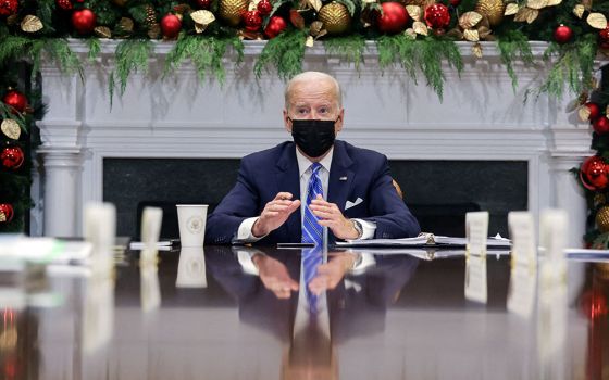 President Joe Biden meets with members of the White House COVID-19 Response Team from the White House in Washington Dec. 16, 2021, about the latest developments related to the Omicron variant. (CNS/Reuters/Evelyn Hockstein)