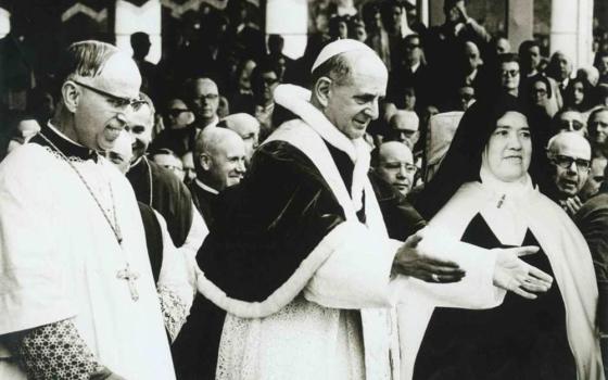 St. Paul VI is pictured next to Carmelite Sr. Lucia dos Santos, one of the three Fatima visionaries, during a visit to the Marian shrine in Fatima, Portugal, May 13, 1967. Sister Lucia died Feb. 13, 2005, at the age of 97. She was declared "venerable" on June 22 by Pope Francis. (OSV News/Courtesy of Diocese of Brescia)
