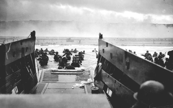 A LCVP (Landing Craft, Vehicle, Personnel) from the U.S. Coast Guard-manned USS Samuel Chase disembarks troops of the U.S. Army's First Division on the morning of June 6, 1944, (D-Day) at Omaha Beach. (Wikimedia Commons/U.S. Coast Guard/Chief Photographer's Mate (CPHOM) Robert F. Sargent)