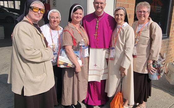 Felican Sisters of North America are pictured with Auxiliary Bishop Bruce Lewandowski of Baltimore at the National Eucharistic Congress in Indianapolis. From left: Sr. Melanie Marie Bajorek; Sr. Bernadette Kapfer; Sr. Grace Marie Del Priore; Lewandowski; Sr. Mary Francis Lewandowski; and Sister Jane Mary Gawlik (Courtesy of Grace Marie del Priore)