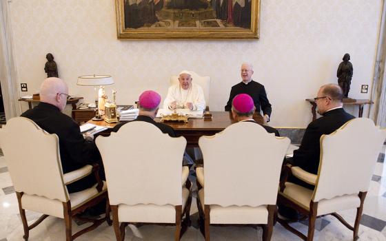 Pope Francis holds his spring meeting with the officers of the U.S. bishops' conference April 18 at the Vatican. Seated from left are: Fr. Paul B.R. Hartmann, associate general secretary; Archbishop Timothy Broglio, president and head of the U.S. Archdiocese for the Military Services; Archbishop William Lori of Baltimore, vice president; and Fr. Michael J.K. Fuller, general secretary. (CNS/Vatican Media)