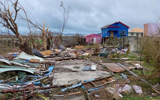 Debris lies around the foundation of a destroyed house on the island of Carriacou, Grenada, July 3,  after Hurricane Beryl. 