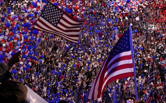 U.S. flags and balloons fill the United Center after Vice President Kamala Harris, the Democratic presidential candidate, gave her acceptance speech during the Democratic National Convention in Chicago Aug. 22.  (OSV News/Reuters/Brendan Mcdermid)