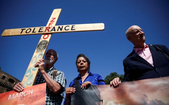 dvocates of zero tolerance for clergy sexual abuse including Peter Isely, right, Tim Law, and Denise Buchanan, attend a march with survivors of clergy sexual abuse and activists near the Vatican in Rome Sept. 27, 2023. (OSV News/Reuters/Guglielmo Mangiapane)