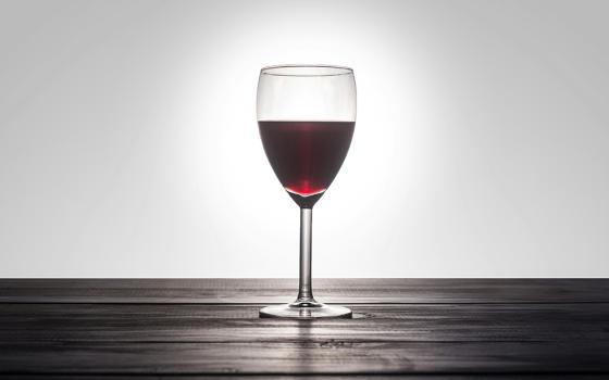 A single glass of red wine (Unsplash/Patrick Fore)