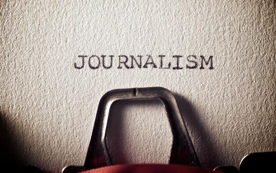 Closeup of the word "JOURNALISM" typed on a typewriter (Dreamstime/Pedro2009)